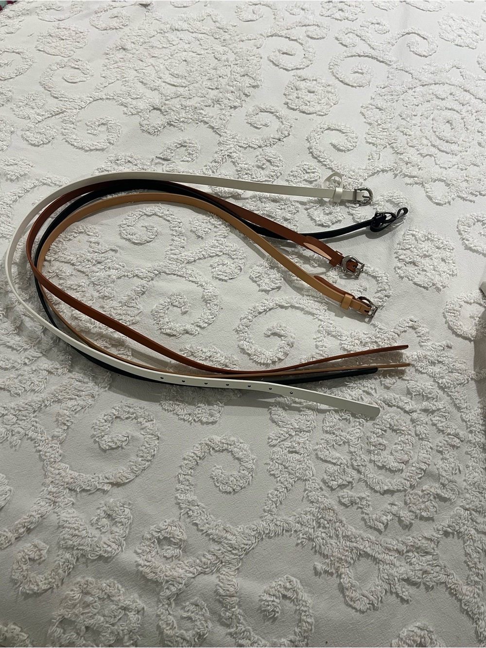 Lot of 4 Women’s Skinny Faux Leather Belts Black Brown Tan White Adjustable